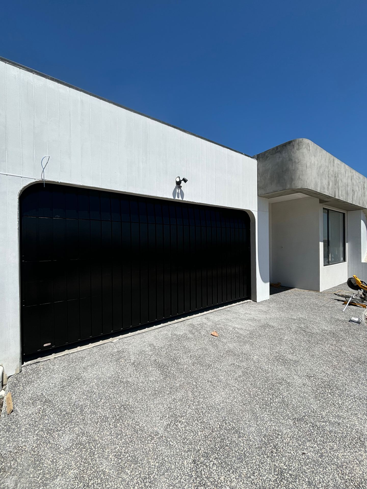 Custom Cladded Panel garage door install 3
