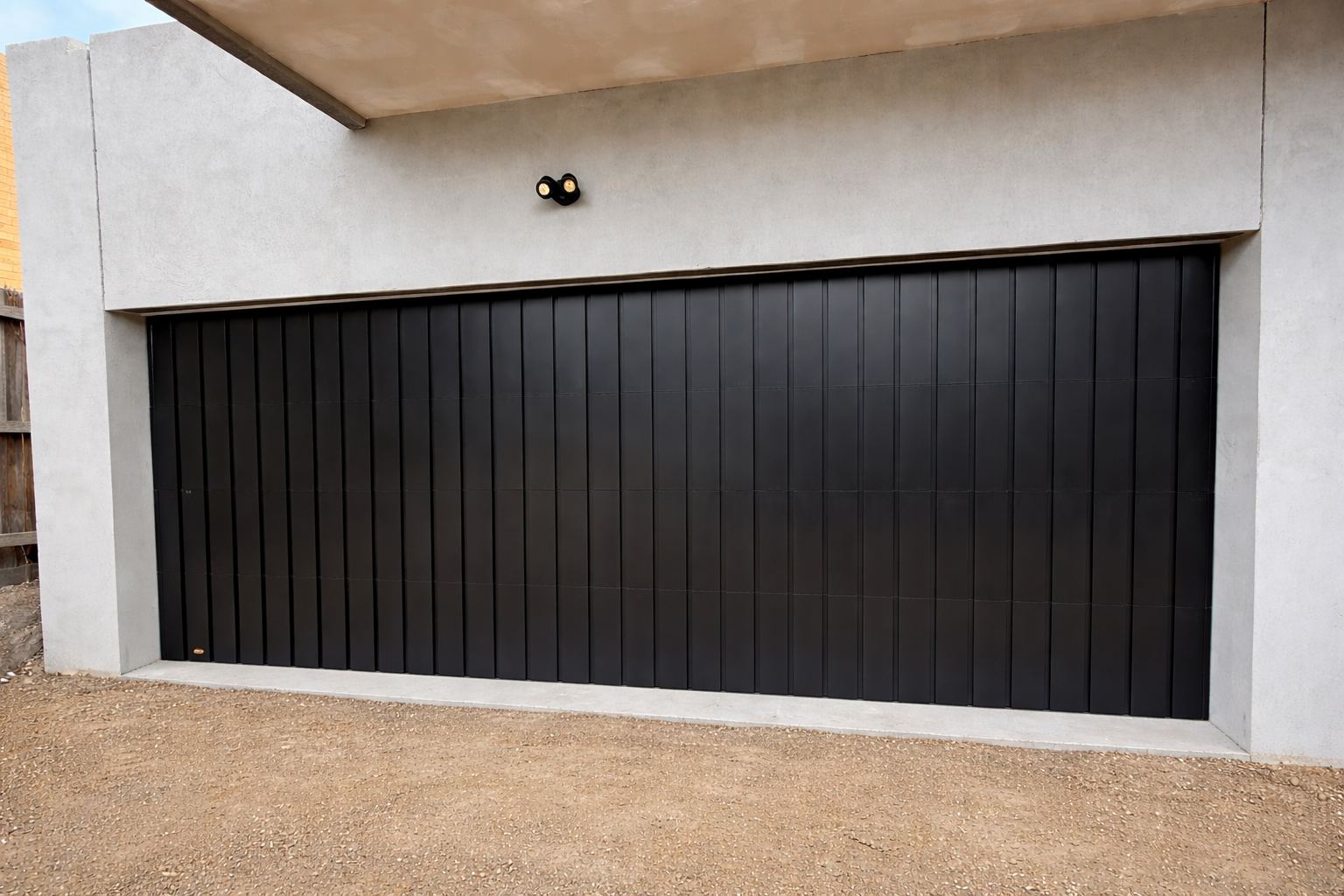 Custom Cladded Panel garage door install 4