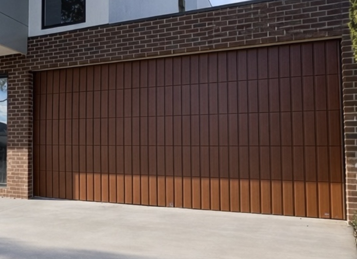 Custom Cladded Panel garage door install 7