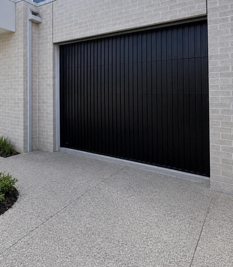 Custom Cladded Panel garage door install 9