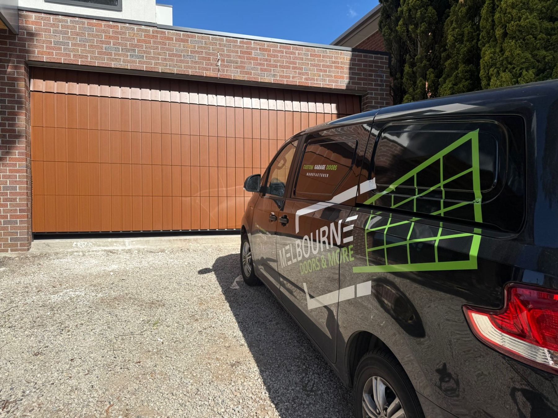 Custom Cladded Panel garage door install 8